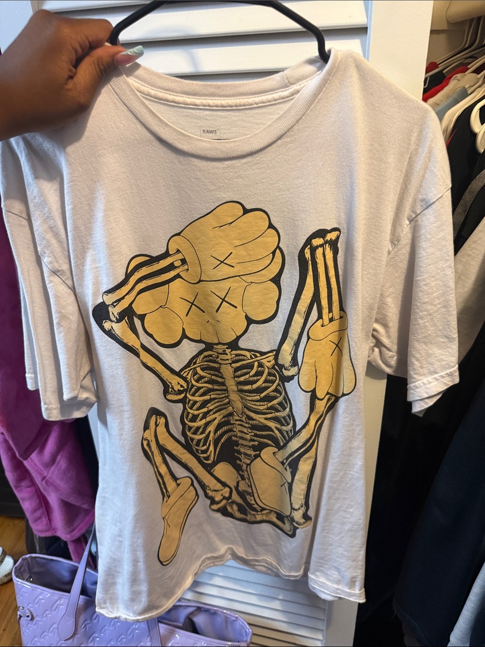 KAWS Kids White Tee with Yellow Skeleton Graphic